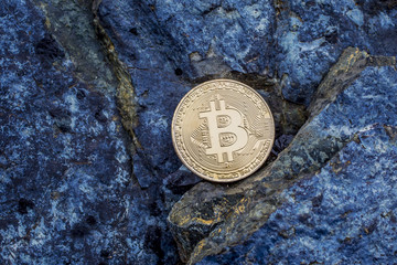 bitcoin on the stone background