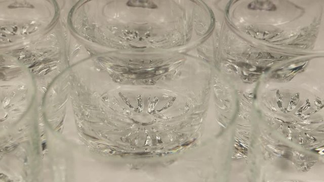 Movement of the variety of  empty drinking glasses