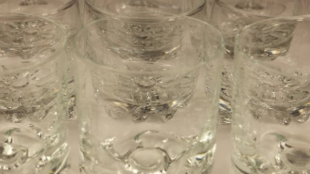 Movement of the variety of  empty drinking glasses