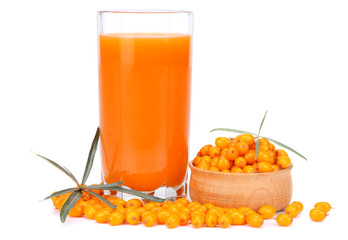 Sea buckthorn juice in glass isolated on white background