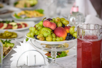 catering table set service with silverware and glass stemware at restaurant before party
