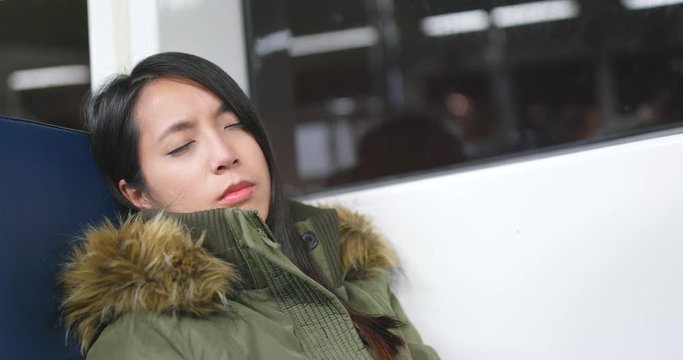 Woman feeling seasick on boat