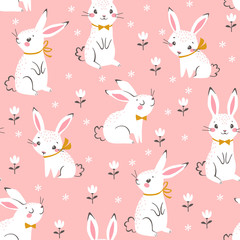 Obraz na płótnie Canvas Seamless pattern of cute white bunnies on pink background with floral elements.