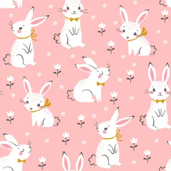 Tapeten Nahtloses Muster von niedlichen weißen Hasen auf rosa Hintergrund mit floralen Elementen. © fireflamenco