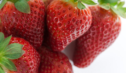 strawberries with leaves on white background