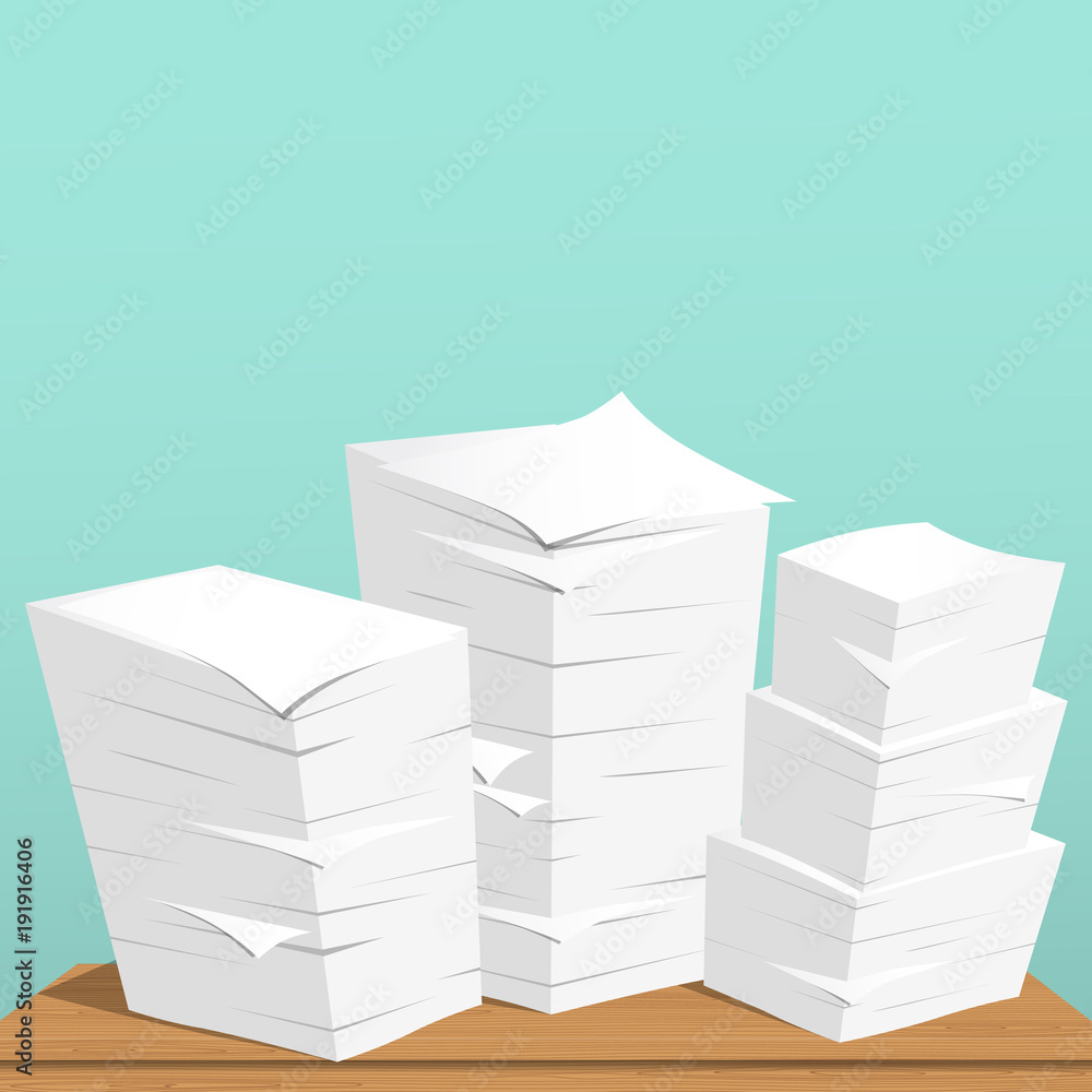 Poster stack of white sheets and paper in office on brown table top.