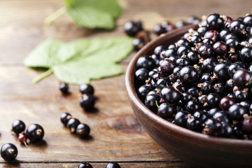 currant on a wooden background