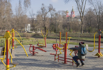 Obraz na płótnie Canvas A children's Playground. Exercise equipment for teenagers. Entertainment for young people.