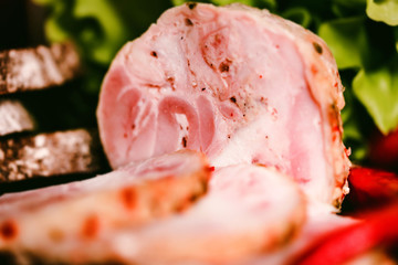 Sliced turkey roll, peppercorn and vegetables