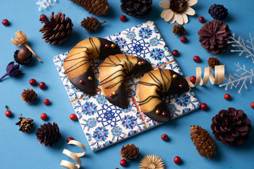 Chinese fortune cookies. Delicious traditional Fortune cookies on a blue background with Christmas...
