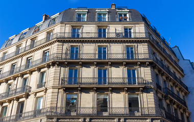 The traditional facade of Parisian building, France.
