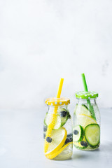 Fresh cool lemon cucumber berry infused water detox drink