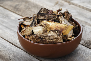 dried boletus in a bowl
