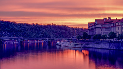 Fototapeta premium Vltava river of Prague , sunrise moment with still water from long exposure