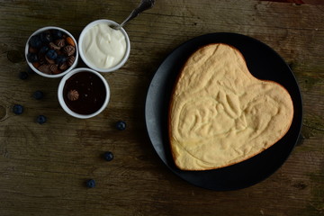Heart shaped chocolate cake. Top view. 