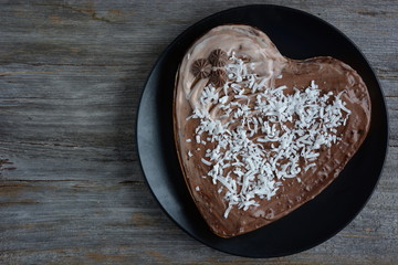 Heart shaped chocolate cake. Top view. 