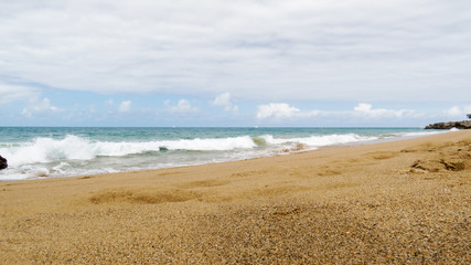 Fototapeta na wymiar A perfect view of the Atlantic Ocean from a beach in Puerto Plata, Dominican Republic.