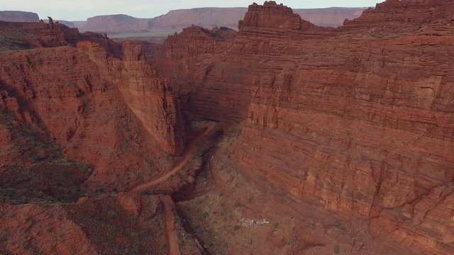 Flying towards Onion Creek narrows in the Utah desert near Moab viewing the steep canyon walls.