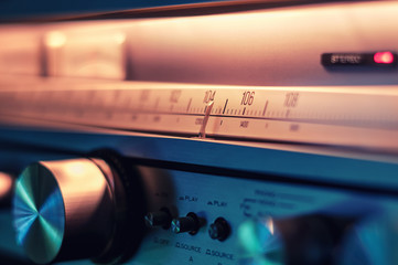 Radio receiver tuner with FM scale and volume knob closeup