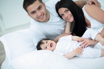 Lovely family morning in the bedroom