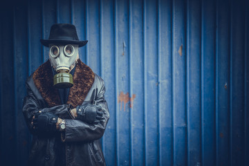 Scary man with gas mask,selective focus and blank space