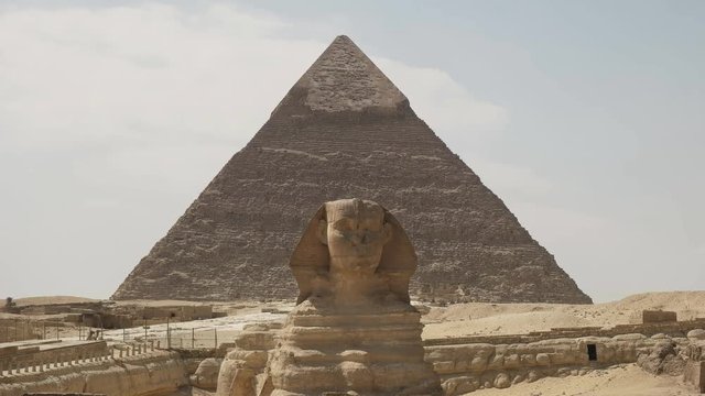 the sphinx in front of the pyramid of khafre at giza near cairo, egypt