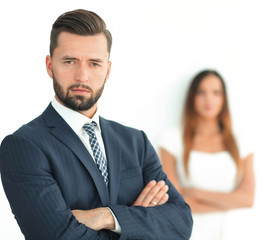 Portrait of a businessman with a woman in the background