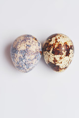 Two Quail eggs on white background. preparation for Easter