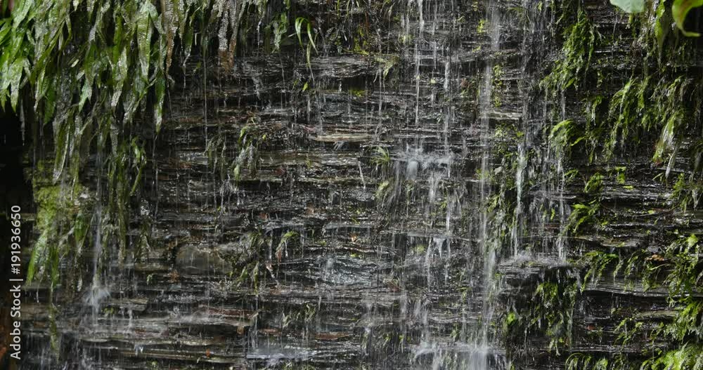 Wall mural Waterfall on stone wall