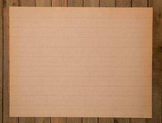 Piece of Blank Vintage Paper on a Wooden Table