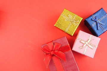 LOVE CONCEPT: Gift boxes isolated on red background. Copy space