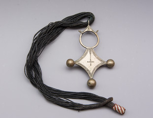 Ancient Agades Cross (front) with necklace, belonging to the Tuareg culture also known as the Southern Cross