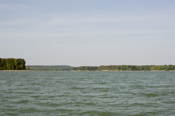 a lake with trees in the background