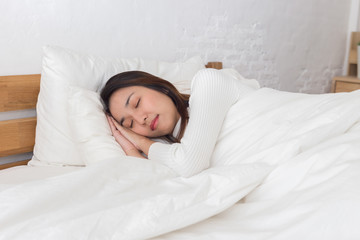 Woman sleep in bedroom in the morning