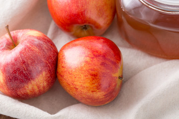 Glass Jar of Apple Juice with fresh apple. Closeup
