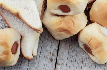 Bread on wooden floor.