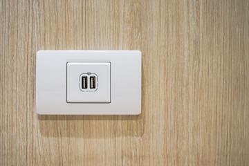 USB socket port with USB signage icon on wooden wall background, Prepared to use.