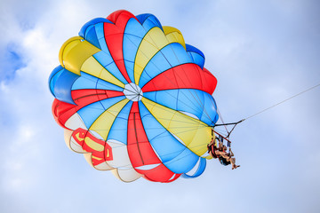 Unidentified tourist doing parachute sailing recreational activity in Boracay Island, Aklan, Philippines