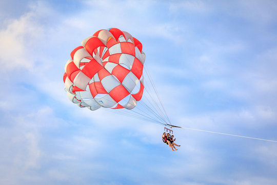 Unidentified tourist doing parachute sailing recreational activity in Boracay Island, Aklan, Philippines