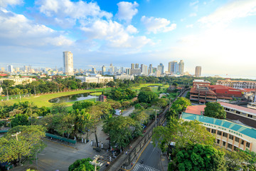 Manila city skyline in Philippines. Ermita and Paco districts seen from Intramuros.