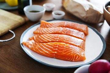 Raw salmon preparing to be cooked