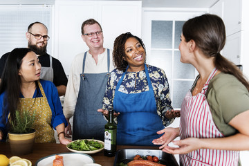 Diverse people joining cooking class