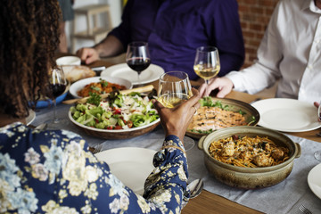 Friends gathering having Italian food together