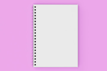 Opend notebook spiral bound on violet background