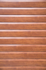 New decorative brown wall imitating wooden boards