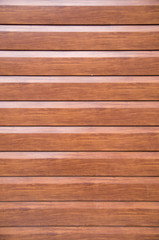 New decorative brown wall imitating wooden boards