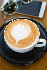 Coffee cup on wooden table