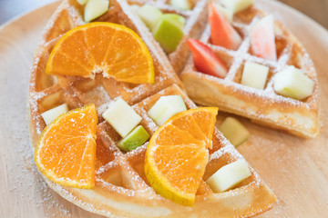 Fototapeta na wymiar waffles and fruit for dessert