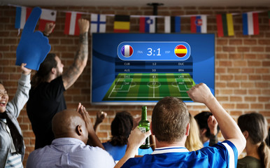 Frieds cheering sport at bar together