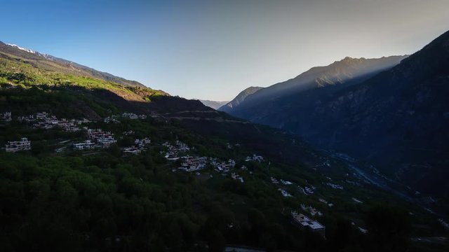 Timelapse of with Landscape View light and shadow Traditional Tibetan Valley folk residence buildings in a well preserved village, Jiaju Tibetan village, Danba, Sichuan, China 